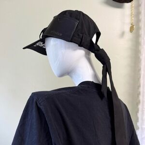 STAFFONLY Black Baseball Hat with Tie  Avant-garde black STAFFONLY cap